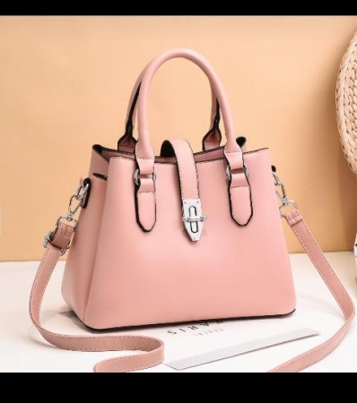 Small Pink leather handbag with an adjustable strap